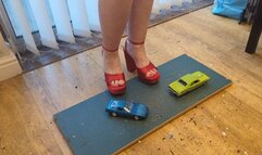 Giantess Lou crushes a Corvette and Chevy Impala in big red chunky heels high left view view