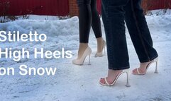 Stuart Weitzman Nudist sandals on ice, stiletto high heels on ice, slippery high heels