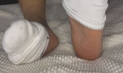 Tiippy does and sock tease puts oil on her feet with no hands