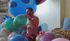 Sebastian blow to pop small balloons and a bigger one