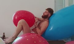 Adam burst giant balloons