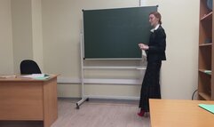 The teacher in the classroom teaches a lesson and plays a little with her sexy high-heeled shoes, but the student does not listen to her, he only dreams of her feet and heels