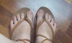 toe tapping in greek sandals