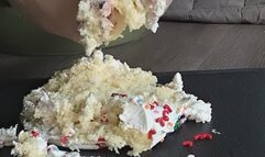 Christmas cake crushing with feet