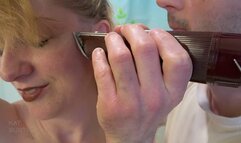 Topless woman's nape and sideburn clippering