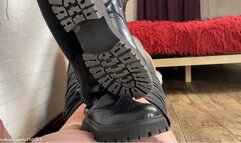 Trampling and stomping slave's useless body with My rough soled boots