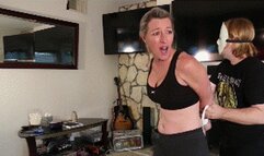 Amanda Kent, a fit MILF blonde gets tightly hogtied and ballgagged before her morning cycling routine