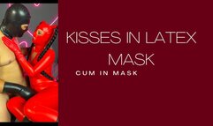 Passionate kisses with a latex mask