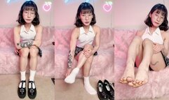 Cute, fit Asian girl shares her honest thoughts on foot fetishes while taking off her shoes and socks