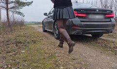 Driving BMW 5 series in Brown Boots