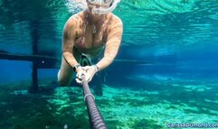 Carissa in a micro bikini snorkeling in the public spring