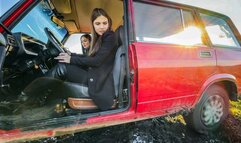 CAR STUCK Two friends got stuck on a muddy road