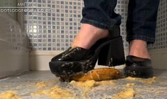 Crushing bananas in platform heels and bare feet