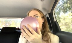 Cute girl fearlessly blows and pops 5 balloons in the back of your car