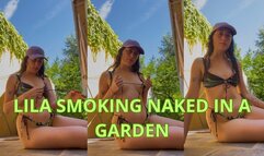 smoking naked in a garden