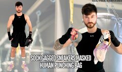 Sock gagged sneaker masked human punching bag