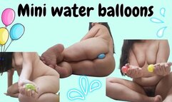 Playing with mini water balloons