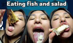 Eating fish and salad