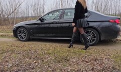 Driving BMW 5 series in Guess Leather Boots