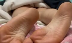 Tickling ultra ticklish girlfriend's feet in bed with oil, hands and brush