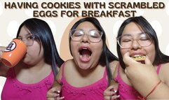 Having cookies with scrambled eggs for breakfast