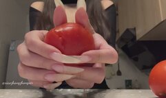 Destroying tomato with my long nails