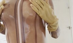 latex rubber transparent catsuit and hood and gloves but plug cum