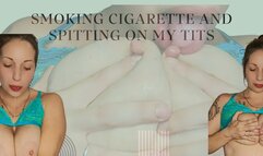 Smoking cigarette and spitting on my tits