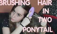 Brushing my hair and making 2 ponytails