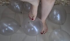 Big feet popping balloons