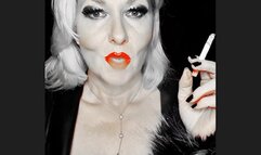 Smoker queen Joan pulls her marlboro red 100 very closly so sexy between her bright red juicy lips that glows just like her red bra