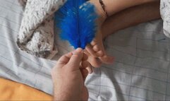 Alessandra in blue feather soles tickling closeup