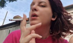 Beautiful italian milf smoking a cigarette in the garden in a sensual way 4K