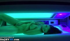 Busty Japanese milf fucked hard in a solarium