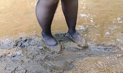 Girl in ballet flats slips hard on muddy surface