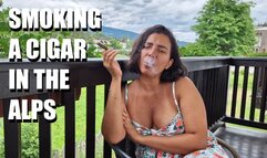 Hot MILF sensually smokes a cigar in the italians Alps
