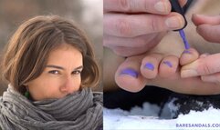 Teresa applies nail polish to her toes outside in the snow - Video update 12400 UHD 4K