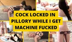 Cock locked in pillory while mistress gets machine fucked