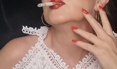 Close up sensual seductive smoke of a Marlboro Red 100s with multiple drags in silk and latex
