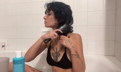 Washing my curly blue hair in the tub