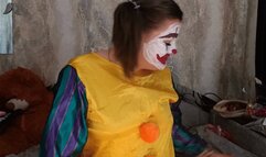 clown girl blowing punchballoon