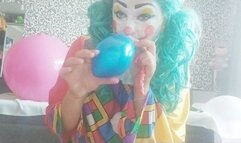 clow girl blowing balloons and play