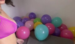Nail popping and sit popping a lot of balloons
