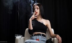 Slim chick is smoking two Reds