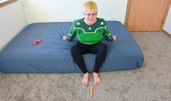 Dylan foot plays with a toy (720)