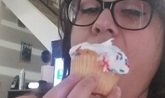 Pretty mouth eating cupcake