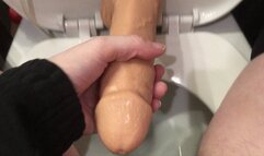 Peeing on and Stroking Your Huge Dick on the Toilet