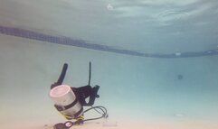 Carissa in a micro-bikini underwater; scuba and pantyhose