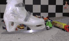 Toy cars and toy stuff under ice skating shoes floor view