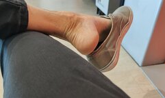 Heelpopping with my worn shoes in the waiting room